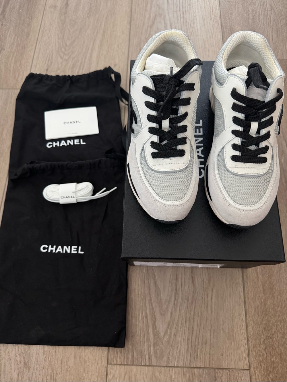 CHANEL White and Black Leather Mesh Sneakers with Black Laces